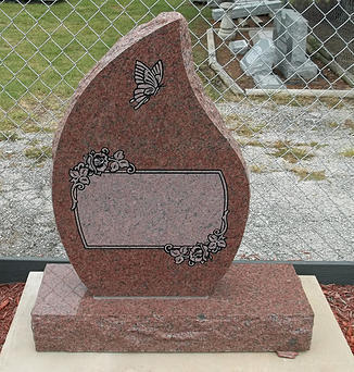 This is a chapel rose monument, with a beautiful panel for displaying your loved one.