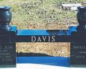 This is a double cremation bench with vases and family memories added.