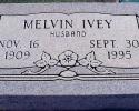 This is a gray, single, flat marker with a book panel surrounding your loved one's information.