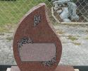 This is a chapel rose monument, with a beautiful panel for displaying your loved one.